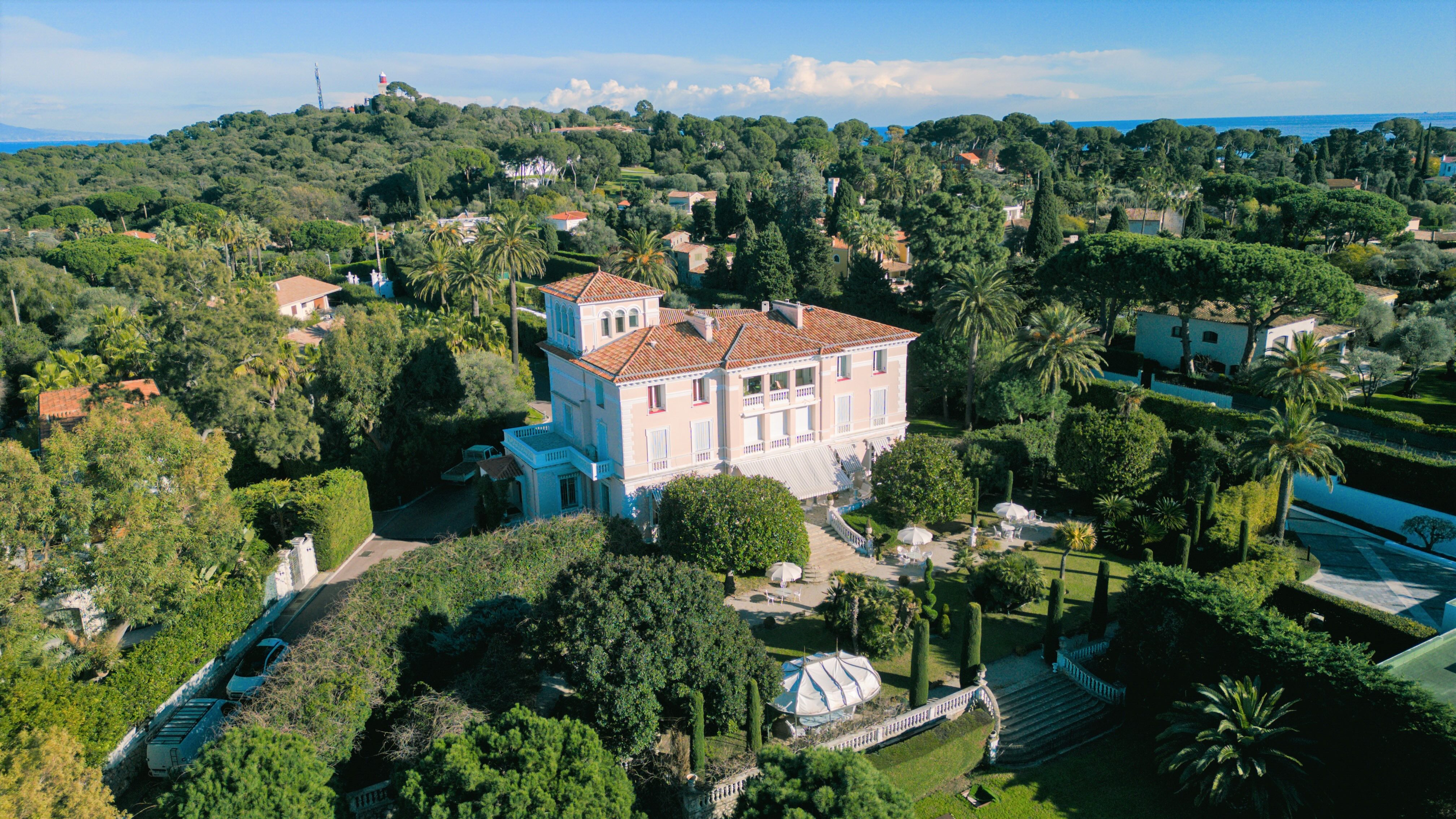 Aerial view of Château Algarve above the garden and Mediterranean coastline